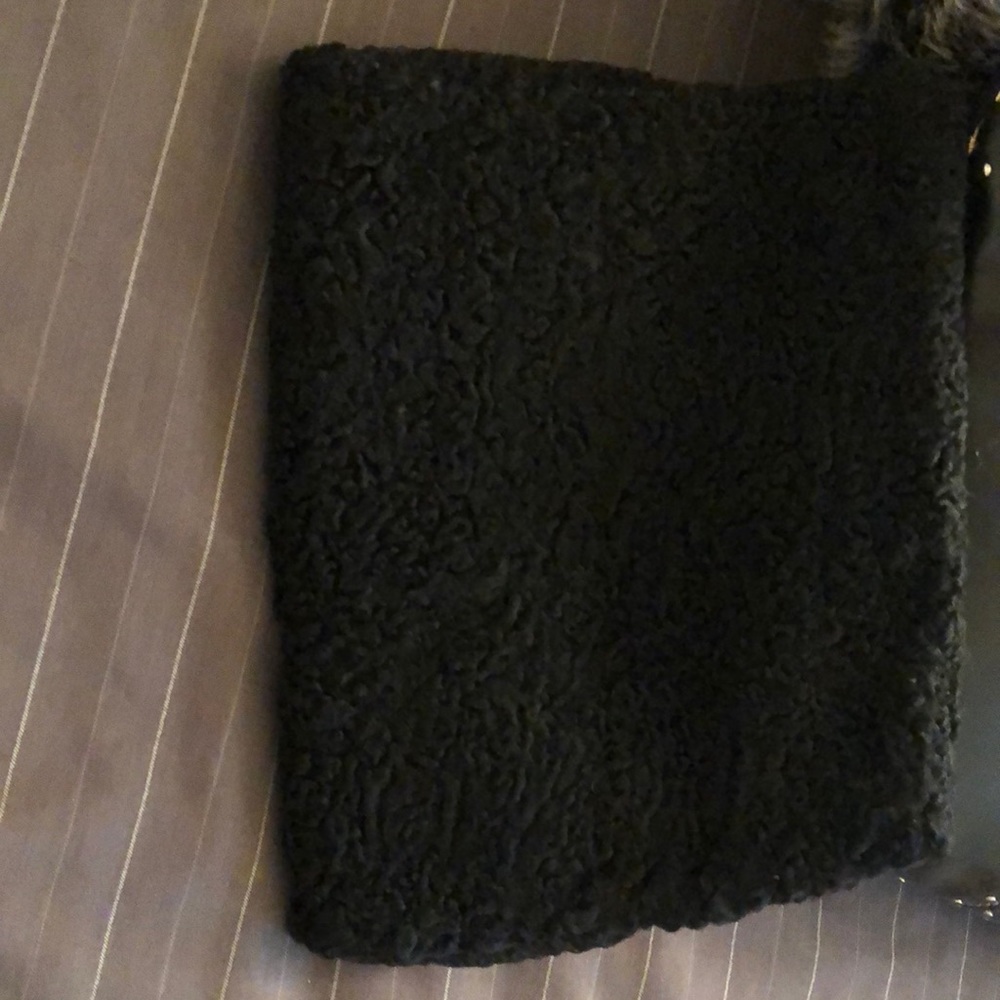 Persian lamb muff with zippered compartment